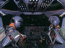 The interior of a B-1B cockpit at night