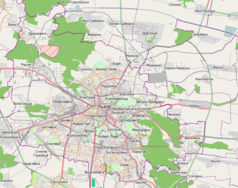 Mapa konturowa Lwowa, blisko centrum na dole znajduje się punkt z opisem „Pałac Sztuki w Parku Stryjskim”