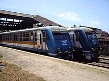 Two commuter trains side by side