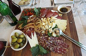 A platter of lunch meat and cheeses in Slovenia