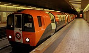 A second-generation train in 2011 orange livery at Buchanan Street