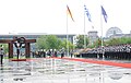 Order of precedence at the state visit of Greek prime minister Antonis Samaras in Berlin (24 August 2012): The Greek flag takes the first order of precedence, followed by the German flag on the right (seen on the left when facing the building) and the European flag in third order, on the left.