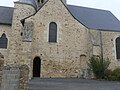 Transept méridional et ses deux ouvertures romanes.