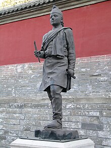 stone statue of Araniko outside the Miaoying Temply in Beijinh