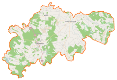 Mapa konturowa powiatu ostrzeszowskiego, u góry po lewej znajduje się punkt z opisem „Piwonie”