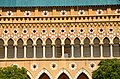 The hall's balconies feature Venetian-Gothic motifs