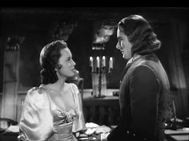 Olivia de Havilland en Errol Flynn in Captain Blood