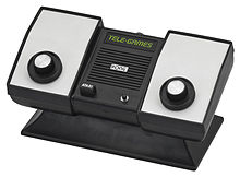 Photo of a dedicated video game console with two knobs.