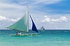 Visayan double-outrigger paraw with a "crane sprit" crab claw sail and a jib