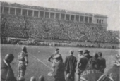 Centre players on their sideline during the game