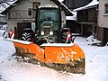 Pala unida a un tractor agrícola.