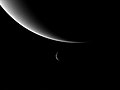 Image 28Neptune and its moon Triton, taken by Voyager 2. Triton's orbit will eventually take it within Neptune's Roche limit, tearing it apart and possibly forming a new ring system. (from Formation and evolution of the Solar System)