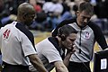 Image 14NBA officials Monty McCutchen (center), Tom Washington (#49) and Brent Barnaky reviewing a play. (from Official (basketball))