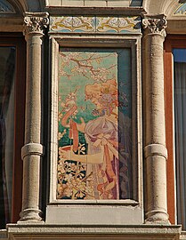 Hand-painted tile panel on the façade of the Grande Maison de Blanc in Brussels, designed by Privat Livemont and made by the Boch Frères Kéramis (1897–98)[218]