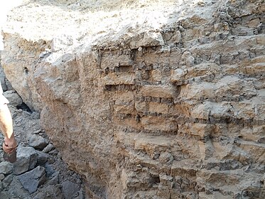 A picture of the remains of the walls of a Canaanite village.