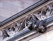 Gargoyle showing carver Roger Morigi with carver's tools, Washington National Cathedral, Washington D.C., USA