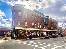 A portion of Roslindale Square on Belgrade Ave., directly across the street from the Roslindale Village Commuter Rail stop.