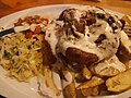 Image 62Pork chop with plantain chips. (from Honduran cuisine)