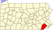 The county is in southeast Pennsylvania, touching the east end of the long straight line of the state's southern border.