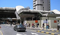 Partial exterior view of the Ampang Line and Sri Petaling's Masjid Jamek station as seen towards the southwest.