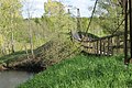 Cable bridge for pedestrians over Iecava river