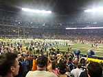 Members of the Toronto Argonauts run onto the field of the Rogers Centre, after winning the 100th Grey Cup in 2012