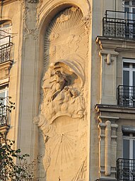 Ethereal scenes (used especially in reliefs on buildings and objects, and in posters) – Façade of Rue Perrée no. 18 in Paris, by Raymond Barbaud and Édouard Bauhain (1908)