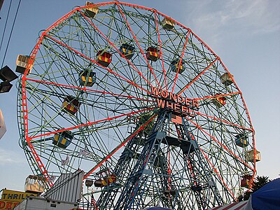 Wonder Wheel, a 45.7-metre (150 ft) tall eccentric wheel at Deno's Wonder Wheel Amusement Park, Coney Island, was built in 1920 by the Eccentric Ferris Wheel Company[179]