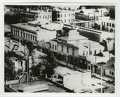 c. 1887 view looking east along south side of 3rd Street incl. former New York Brewery, towards Main (across top). Back left: The Thom Block. Back right: Olmsted & Wales bookstore in the Panorama Building.