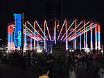 WindSeeker at night during loading/unloading. The sign on the left changes colors along with the ride unit. Taken June 30, 2011.