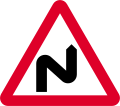 Double bend ahead first to right (symbol may be reversed)