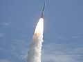 Fire and smoke light up a blue sky as a United Launch Alliance Delta II Heavy rocket propels GRAIL into space.