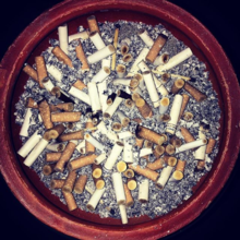 Ashtray full of Cigarette butts