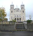 Biserica nouă de zid cu hramul „Adormirea Maicii Domnului”