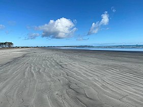 Grey sand at Carters Beach, New Zealand