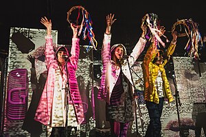 Superorganism performing in 2018. From left to right: B, Ruby, and Soul.