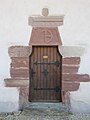 Side door at the Church of Dompeter