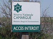 Photographie d'un panneau de la réserve nationale de Camargue