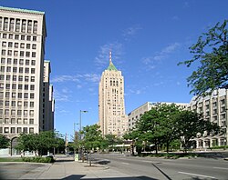 Grand Boulevard looking west through New Center. The National Historic Landmarks Cadillac Place (left) and the Fisher Building in the background, with the Hotel St. Regis on the right