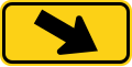 W16-7p (D) Downward diagonal arrow to the right (plaque)