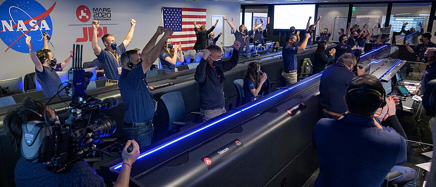 JPL employees celebrate the landing of the Perseverance rover in JPL's mission control