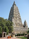 Mahabodhi temple and the Bodhi Tree to its left, Bihar