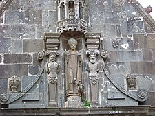 The depiction of Saint Aurelian with two caryatids on the ossuary gable