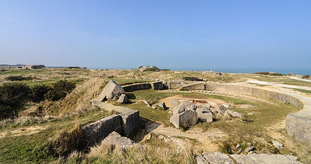 Part of the modern day site, with the remains of a gun pit in the foreground.