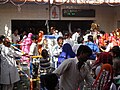 Devotees waiting in the courtyard for their turn to worship.