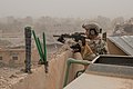 A Special Forces operator in Syria alongside a SF Multi-Purpose Canine provides security for a nearby mortar position during the Deir ez-Zor campaign, October 11, 2018.