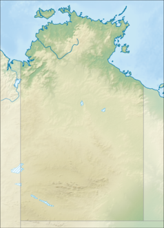 Mapa konturowa Terytorium Północnego, blisko dolnej krawiędzi po lewej znajduje się czarny trójkącik z opisem „Uluru”