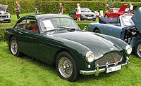 Green, low-slung sports car