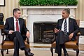 US Ambassador Rick Olson with President Barack Obama, in the Oval office, with guttae on the Ionic fireplace.