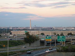 Cars on I-395, leaving Washington DC (in distance) and passing by the Pentagon in Arlington